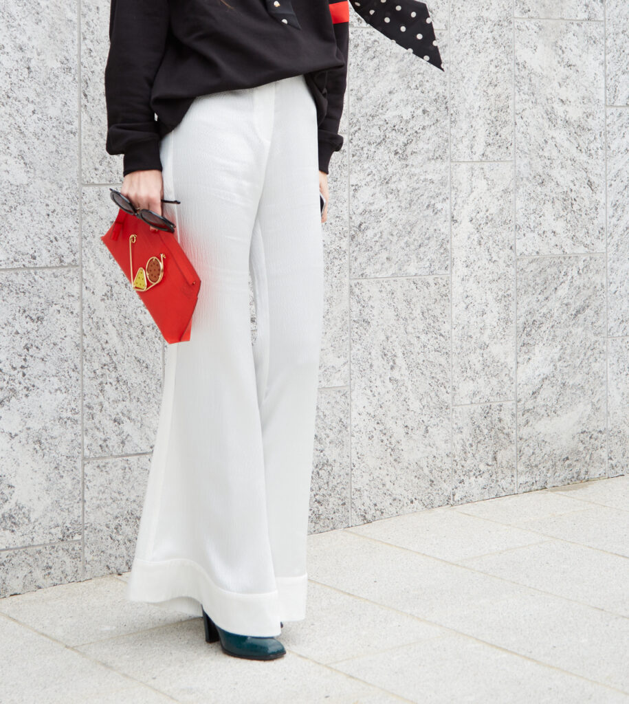 Curvy petite wearing high-rise pants